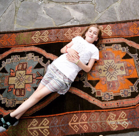 child-on-handmade-carpet
