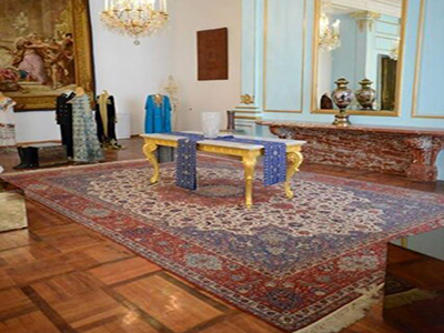 Lachak-Toranj rug by Master Mohammad Seirafian, which is kept in Niavaran Palace